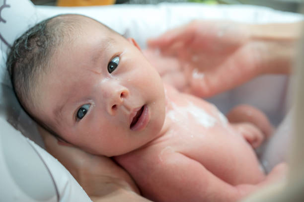istock cute japanese baby bath room 1483747117