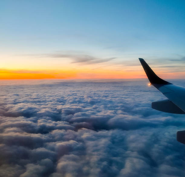 istock Morning sky over a cloud cover as seen from the plane 1483754680