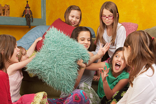 istock Little Girls Pillowfighting 148375497