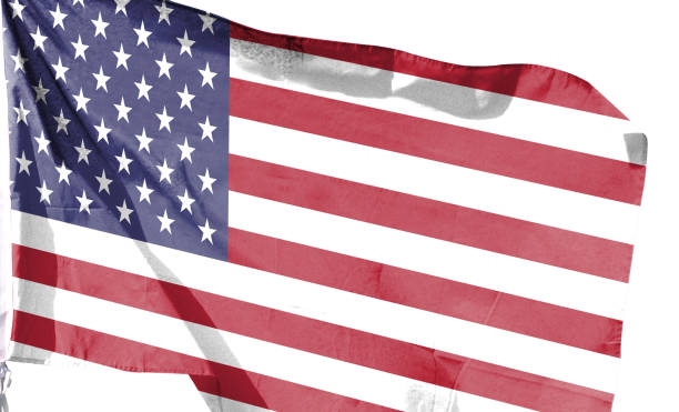 istock American flag on cloudy sky. waving in the sky 1483759779