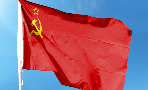 istock Soviet Russian flag in the cloudy sky. waving in the sky 1483761821