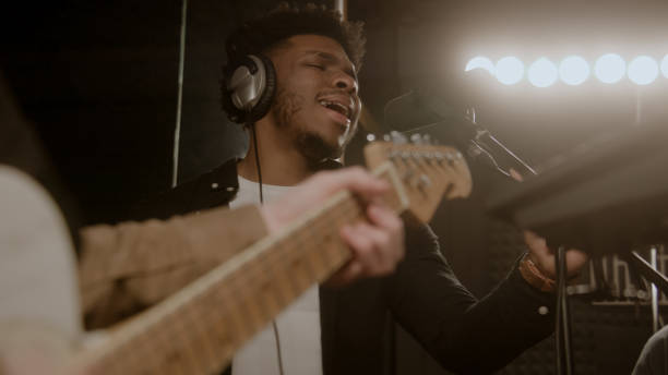 istock Multi ethnic musical band records new song 1483763475