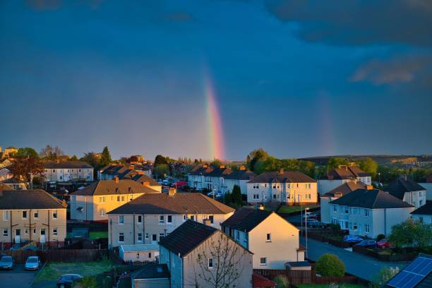 istock Rainbow spanning the sky over a bustling urban landscape. 1483770603