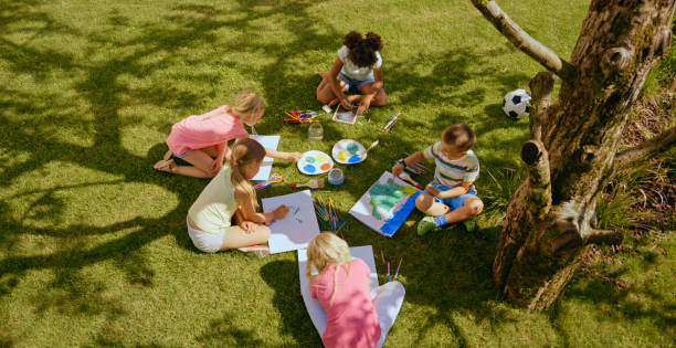 istock Children drawing in garden 1483772731