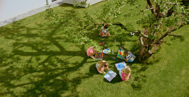 istock Children drawing in garden 1483772742