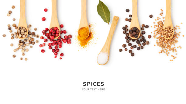 istock Different spices in bamboo spoon isolated on white background 1483778127