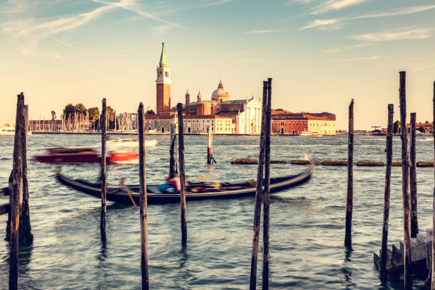 istock Gondola ride in Venice, Italy at sunset. 1483780761