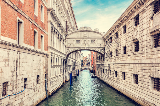 The Bridge of Sighs on canal in Venice, Italy. Famous tourist destination