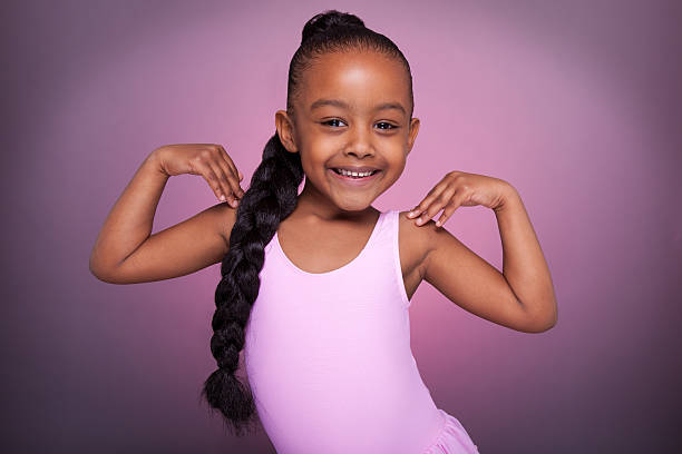 linda little african american girl dancing - ballet dress studio shot costume fotografías e imágenes de stock