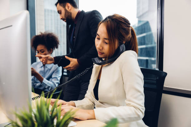 istock Call center business woman talking on headset. 1483786248