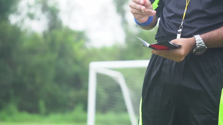 Assistant referees in action during a soccer match