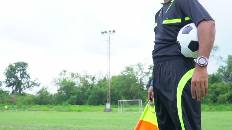 Assistant referees in action during a soccer match