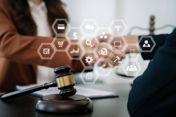 istock partner lawyers attorneys shaking hands after discussing a contract agreement done. 1483799954