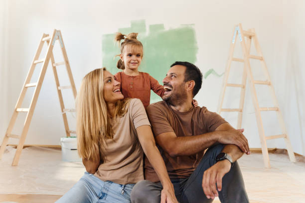 istock Happy family enjoying during home renovation process. 1483804712
