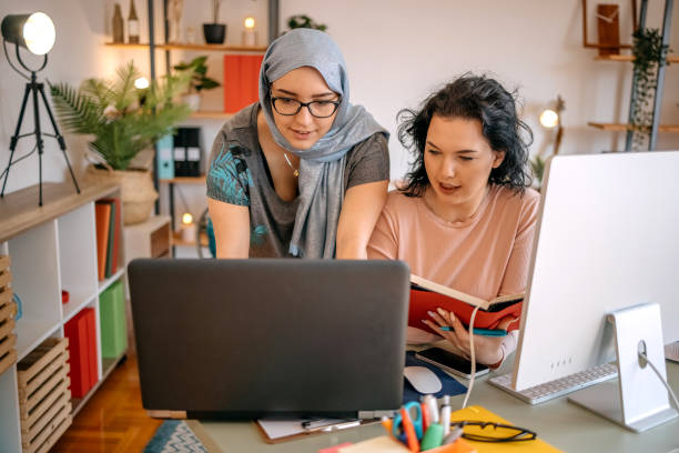 istock Female friends studying at home 1483807511