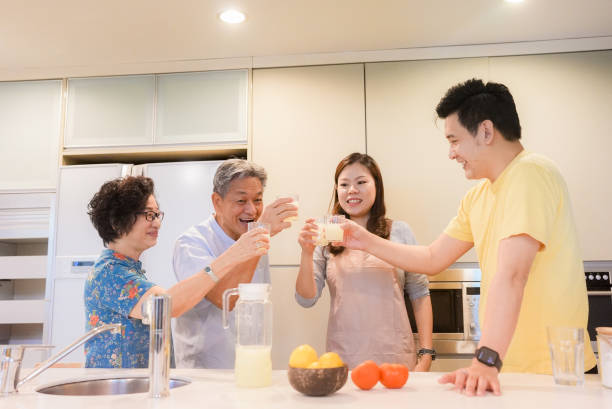 istock Lively relaxed two generation family gathering in kitchen 1483811183