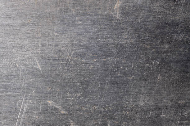 istock Close up of scratched old Brushed Steel background 1483811678