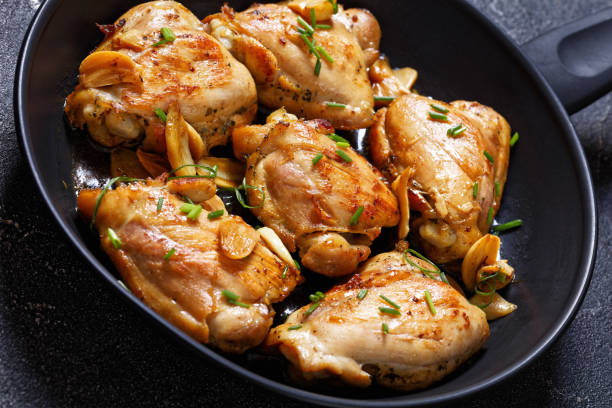 istock garlic rosemary thyme herbed fried chicken thighs 1483815227