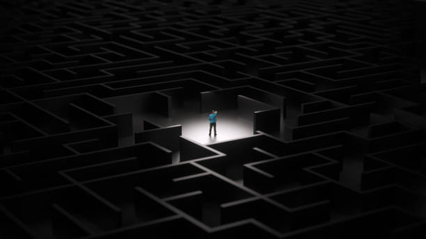 Man inside maze Man lost in a complex maze, surreal concept riddle stock pictures, royalty-free photos & images
