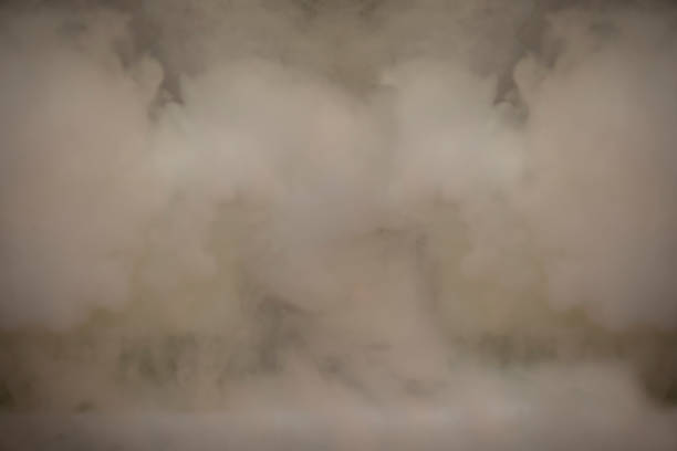 istock Blurred background with thick puffs of smoke. 1483820313