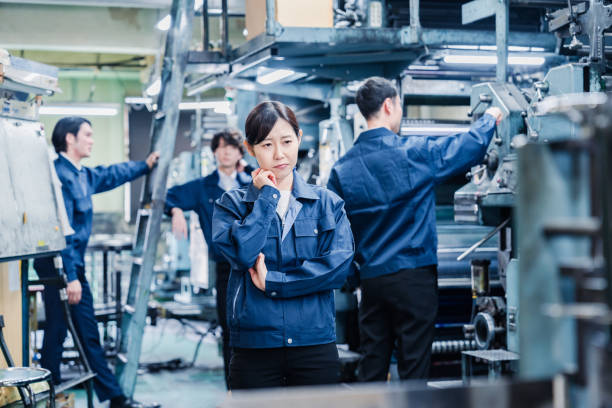 istock Workers in distress at a factory 1483822079