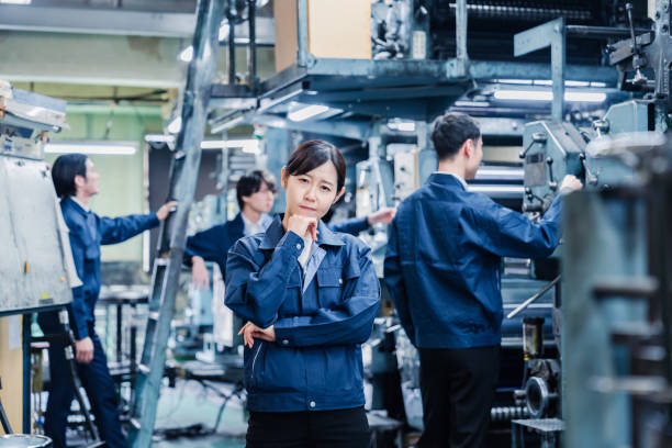 istock Workers in distress at a factory 1483822089
