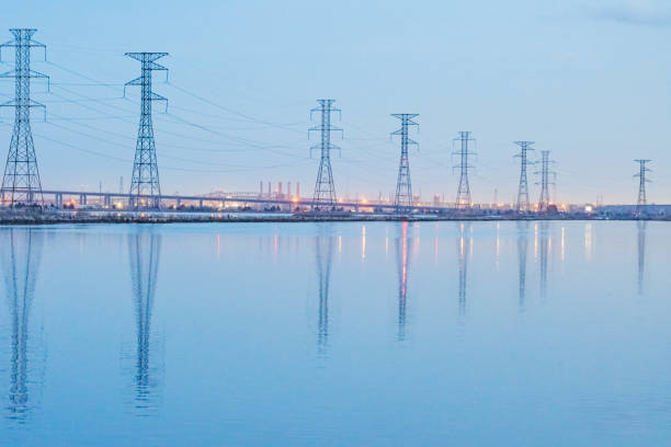 istock Power lines with nyc skyline in the background dusk 1483824290