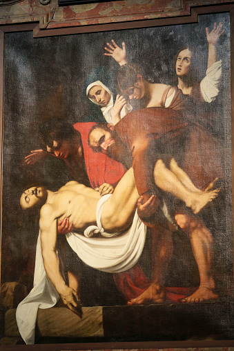 Milan, Italy - April 8, 2023: Milan, Lombardy, Italy: interior of the medieval San Marco church. Deposition by Caravaggio