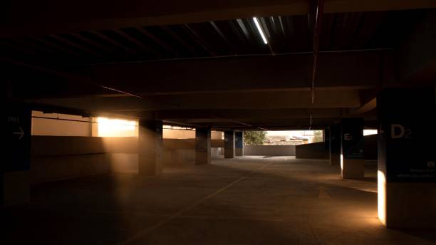istock Urban parking garage with a gritty aesthetic, featuring framed windows along the walls 1483826997
