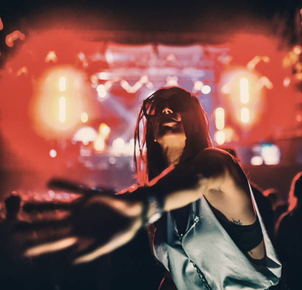 istock Woman enjoying a concert party. 1483833035