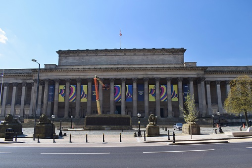 Liverpool, Merseyside, United Kingdom - April 18 2023: St George's Hall, Liverpool, setting up banners in preparation for the 67th Eurovision Song Contest 2023 in support of Ukraine, 'United by Music'.