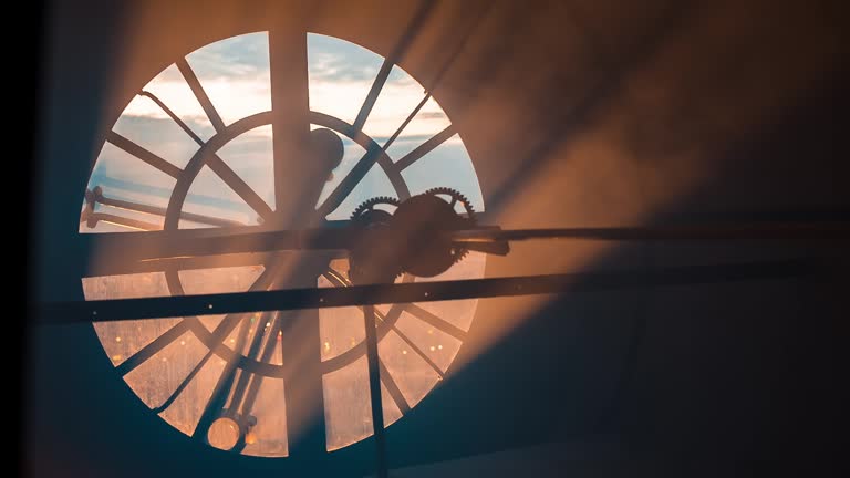 Light shining through a clock face.