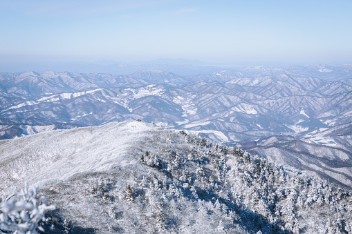 Winter view of the snowy Špik mountain in Julian Alps, Gorenjska, Slovenia, Europe