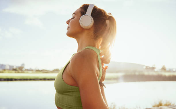 istock Woman in her 30s prepares to start her exercise routine on a sunny summer day 1483845533