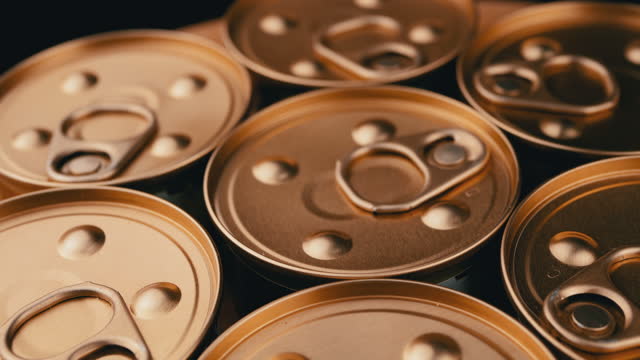 Close up, Slow Rotation of Metal Cans with Canned Food or Pate. 4K