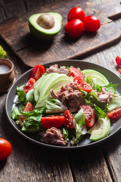 istock Salad with tuna, avocado and tomatoes in a bowl 1483848149