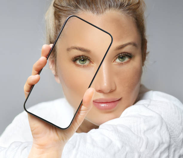 istock Dark spots, freckles,hyperpigmentation(melasma or chloasma),woman using smartphone for skin diagnostics, cosmetology and dermatology concept. 1483857511