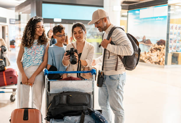 istock Family in airport terminal 1483860765