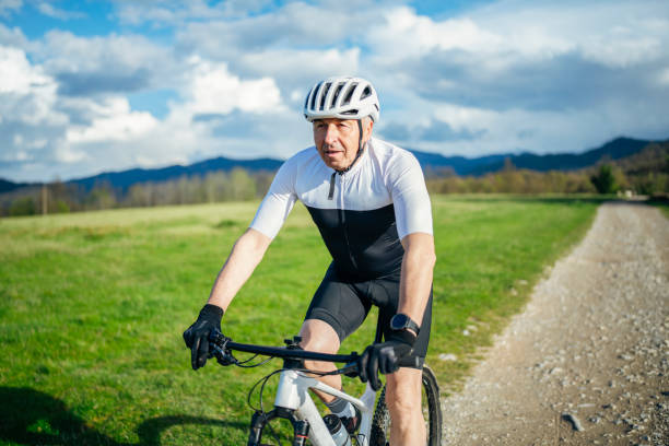 istock Senior man in great athletic shape riding mountain bike. 1483865775