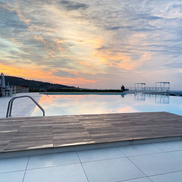 istock Stunning view of a pool reflecting the mesmerizing sunset 1483866406