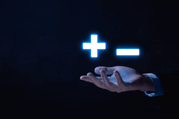 istock Hands showing plus and minus signs. Decision. Business choice, reverse. 1483867370