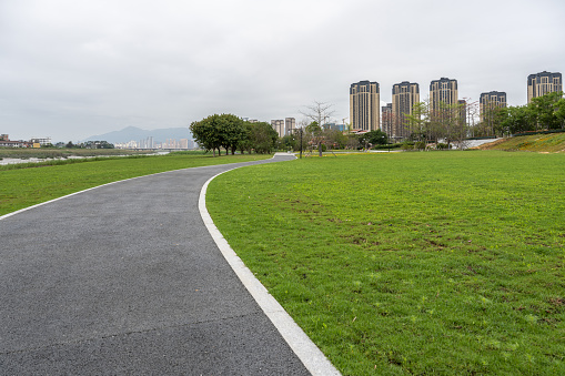 The path of the park next to the urban residential area