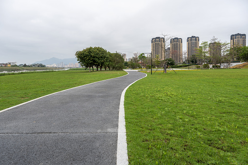 The path of the park next to the urban residential area