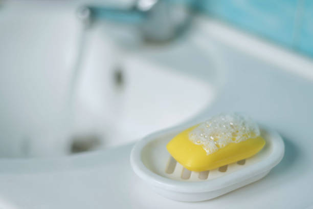 istock Yellow soap on a white background Lemon soap. 1483876880