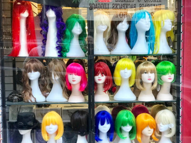 istock Colorful wigs in shop window 1483880778