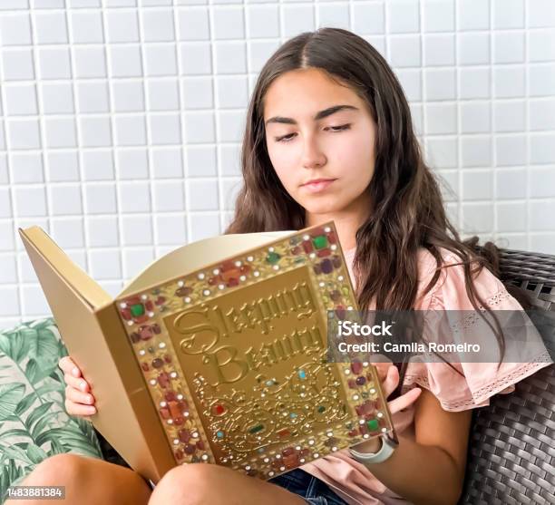 Girl Reading Stock Photo - Download Image Now - 12-13 Years, Book, Brazil