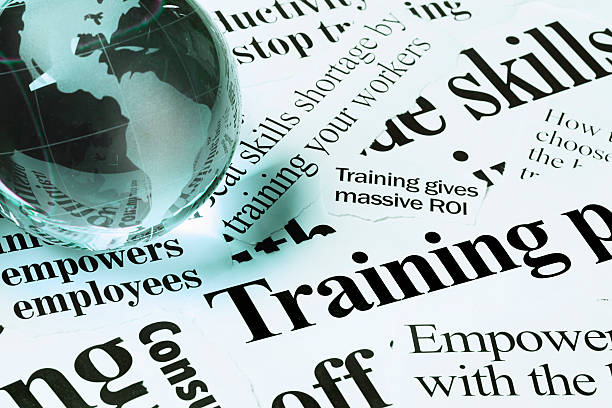 istock Glass globe paperweight on headlines concerning skills & training 148389246