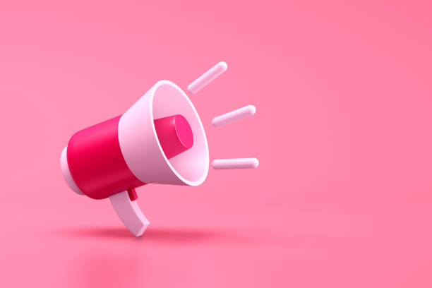 istock Single pink and white electric megaphone with a handle stands on a pink background 1483898191