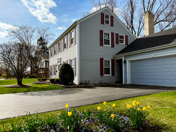 Springtime in the Suburbs Saltbox colonial house in springtime driveway colonial style house residential structure stock pictures, royalty-free photos & images