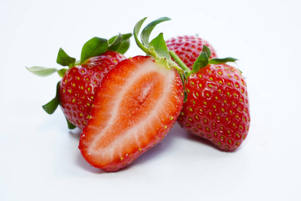 istock fresh strawberries isolated on white background 1483904692